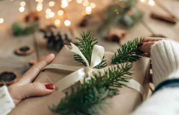 Close Photo Female Hand Red Nail Polish Wrapping Opening Christmas — Stock Photo, Image