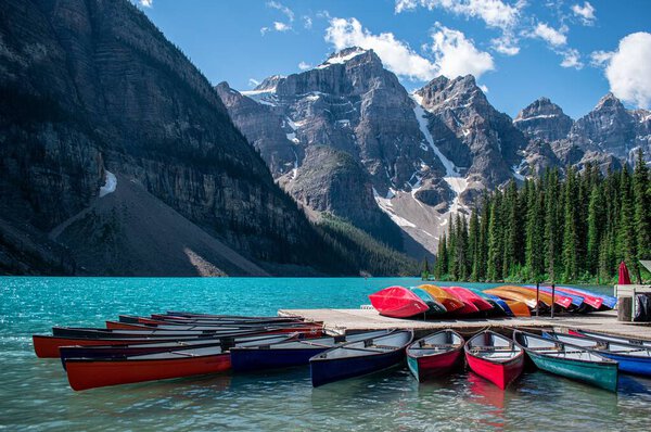 A group of boats near the lake shore