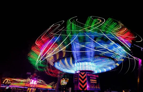 Long Exposure Shot Glowing Illuminated Rides Annual Street Fair Giles — Stock Photo, Image