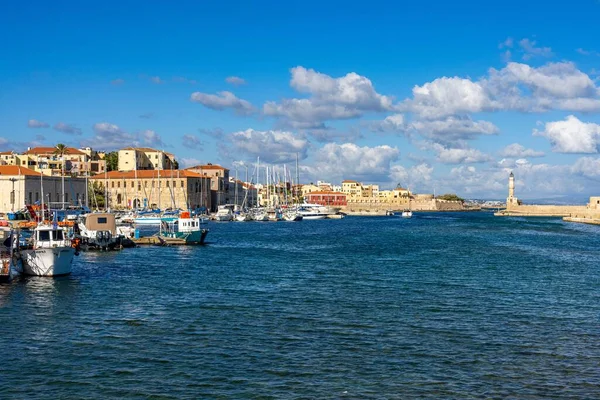 stock image A landscape view of the Chania harbor in Crete island, Greece  with the lighthouse in the background