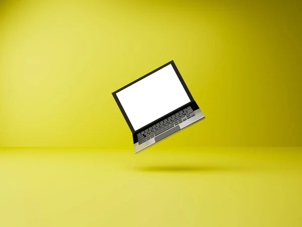 Laptop Flyter Luften Gul Bakgrund — Stockfoto
