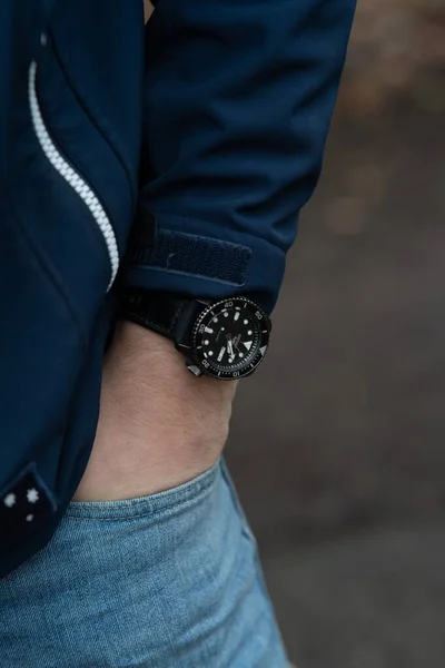 Vertical Shot Guy Wearing Black Watch Hand His Pocket — Stock Photo, Image