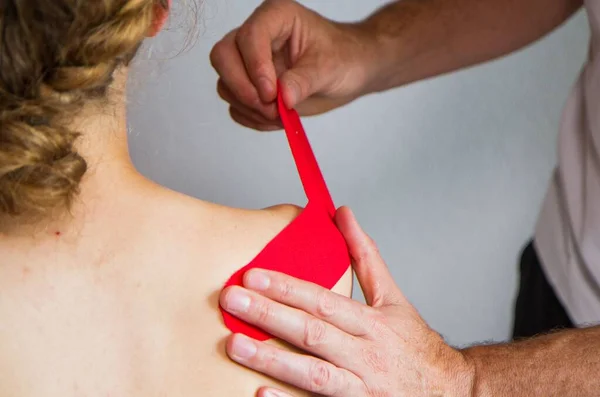 Caucasian Hands Putting Tape Shoulder Physical Therapy — Stock Photo, Image