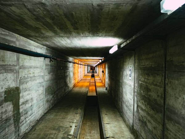 A closeup shot of an elevator shaft and lights inside for security purposes