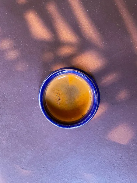 stock image A vertical closeup of a cup of coffee.