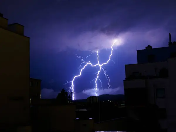 Closeup Shot Lightning Night Illuminated Buildings Town — Stock Photo, Image