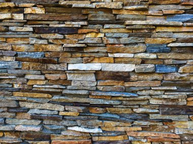 Taş bir duvarın yakın çekimi - arka planlar için harika