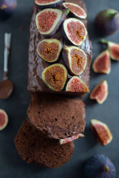 stock image A closeup of a delicious chocolate fig cake on a table