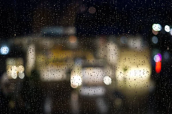 Pioggia Cade Sul Vetro Con Luci Notturne Sullo Sfondo — Foto Stock
