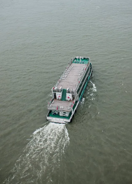 stock image A drone shot over a cruise ship in the River water