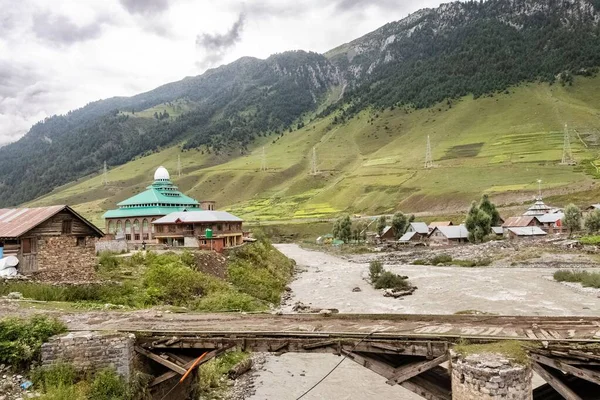 stock image A beautiful mountain scenery with houses and river in a valley on the Sonamarg Hill Trek in Jammu and Kashmir, India