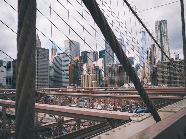 The Brooklyn bridge and modern buildings in Manhattan. New York, USA