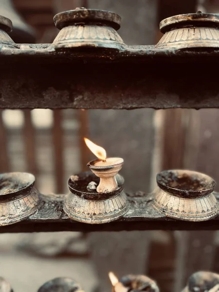 Glowing Candle Stone Candlestick — Stock Photo, Image