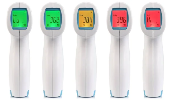 異なる数を示す非接触医療用赤外線温度計のクローズアップビュー — ストック写真