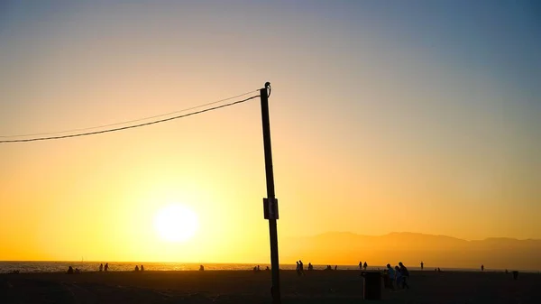Silueta Tyče Pobřeží Při Západu Slunce Los Angeles — Stock fotografie