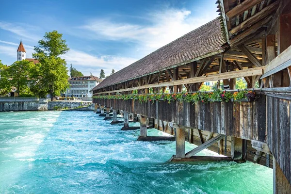 Stock image The beautiful Chapel bridge in Thun, Switzerland over a turquoise lake