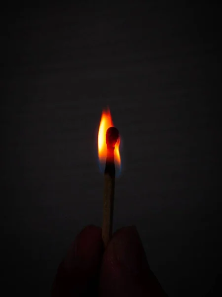 Vertical Closeup Shot Burning Match Black Background — Stock Photo, Image