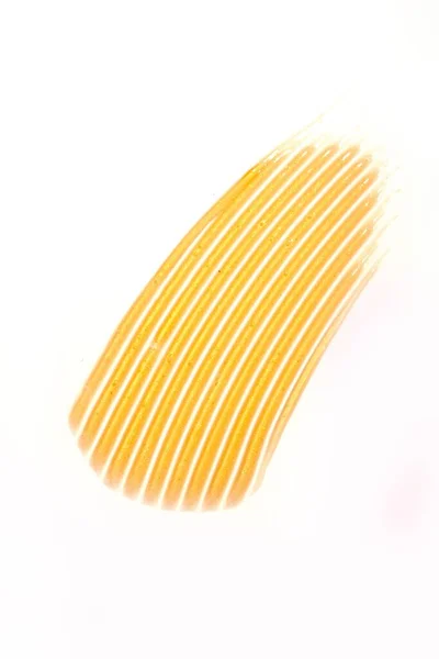 Tiro Vertical Uma Textura Cuidados Com Pele Dourada Sobre Fundo — Fotografia de Stock