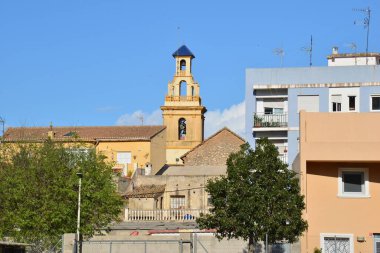 A beautiful view of the Church of El Verger under the blue sky clipart