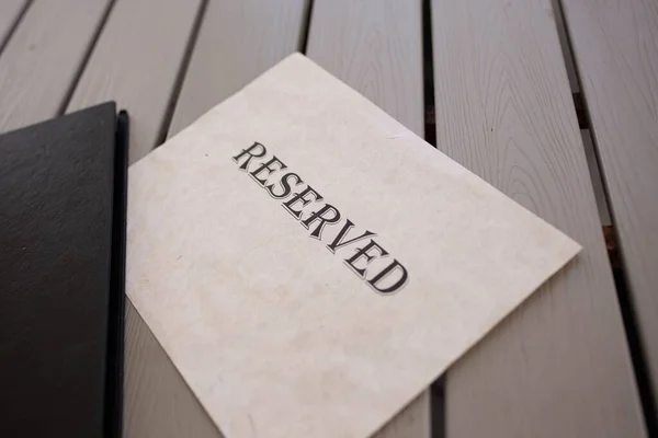 Craft Paper Writing Reserved Wooden Table — Stock Photo, Image