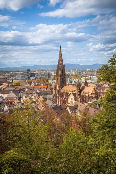 stock image A beautiful shot of the cityscape with the view on Freiburg Minster in Breisgau, Germany