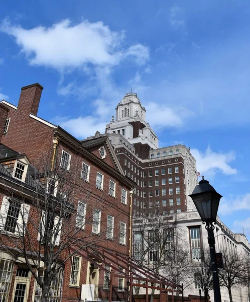 stock image An outdoor view of old residential buildings under a blue sky