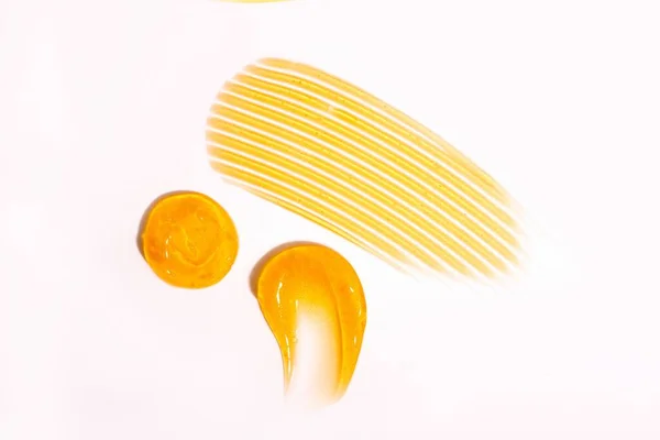 Tekstur Skincare Emas Pada Latar Belakang Putih — Stok Foto