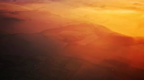 Luftaufnahme Über Hügeln Bei Sonnenuntergang — Stockfoto