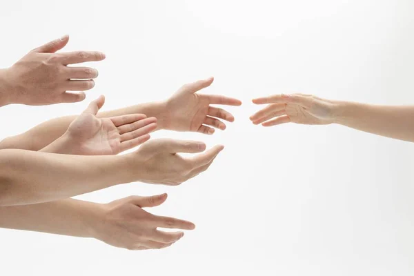 Closeup Shot Helping Hands Touching Front Gray Background — Stock Photo, Image