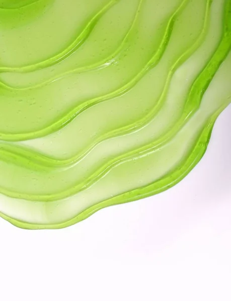 Colpo Verticale Una Texture Skincare Verde Aloe Lucidata Uno Sfondo — Foto Stock