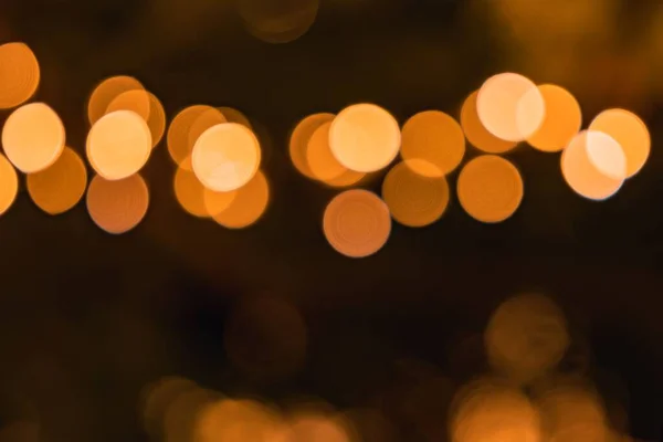 Ein Schöner Hintergrund Mit Leuchtend Goldenen Bokeh Lichtern — Stockfoto