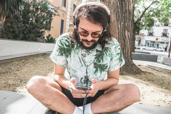 Young Male Long Hair Facial Hair Sunglasses Headphones Listening Music — Stock Photo, Image
