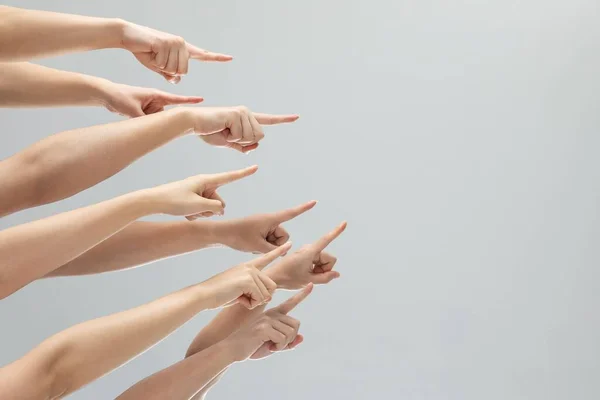Closeup Shot Bunch Hands Pointing Something Gray Background Copy Space — Stock Photo, Image