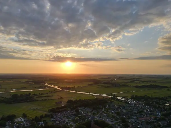 Aerial Shot Small Town Green Fields Warm Sunset Clouds — Stock Photo, Image