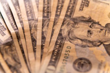 A macro of twenty dollar bills clipart