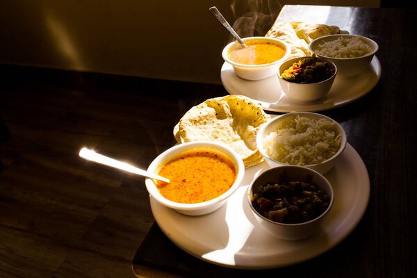 Mixed veg in red hot curry served with Indian roti chapati or Indian Flatbread