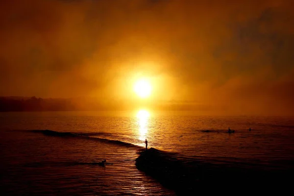 夕日と海の静かな地平線 — ストック写真