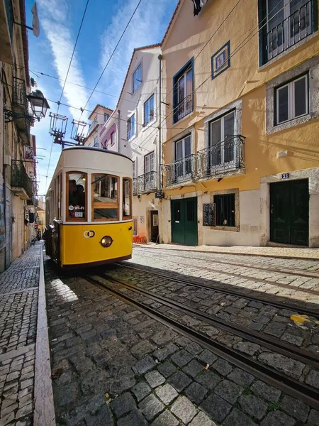 Vertical Shot Yellow Tram Narrow Street Lisbon Portugal — Stock Photo, Image
