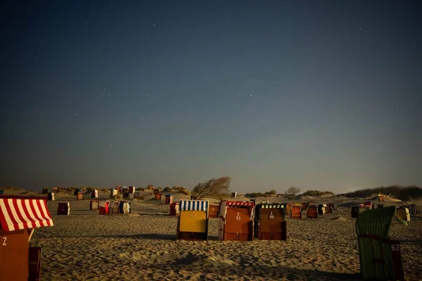 Multiple Closed Beach Chairs Sand Coast Blue Starry Sky Night — Stock Photo, Image