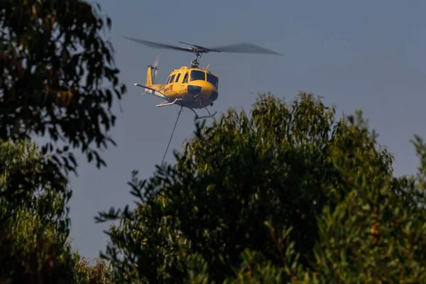 Huey Firefighting Helicopter Green Trees — Stock Photo, Image