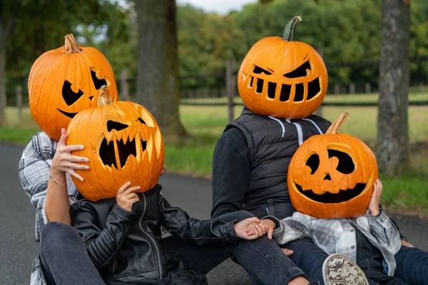Family Carved Pumpkin Heads Park — Stock Photo, Image