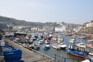 A beautiful view of the Mevagissey harbor on a summer's day, United Kingdom. clipart