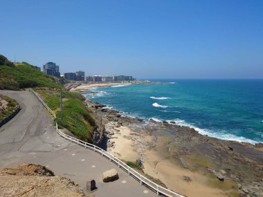 New Castle, Delaware 'deki güneşli plajın havadan görüntüsü.