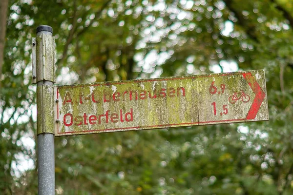 Closeup Shot Street Sign Translation Att Oberhausen Easter Field — Stock Photo, Image
