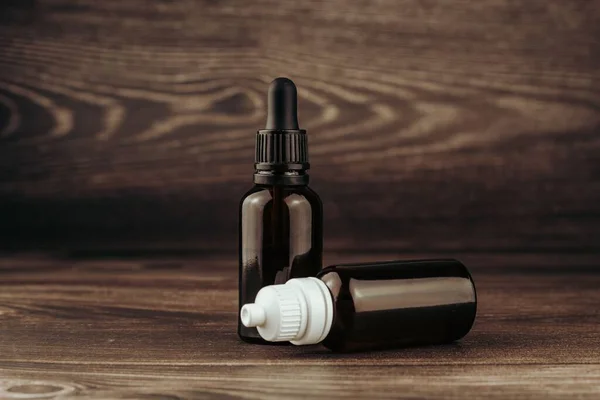 stock image A closeup of CBD oils in brown glass bottles