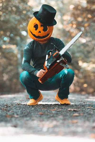 Vertical Shot Young Boy Wearing Pumpkin His Head Forest — Stock Photo, Image