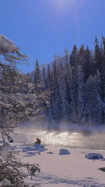 stock image A river in snowy mountains on a sunny day