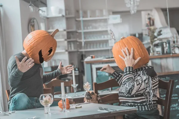 Closeup Shot Friends Wearing Pumpkins Heads Making Fun Each Other — Stock Photo, Image