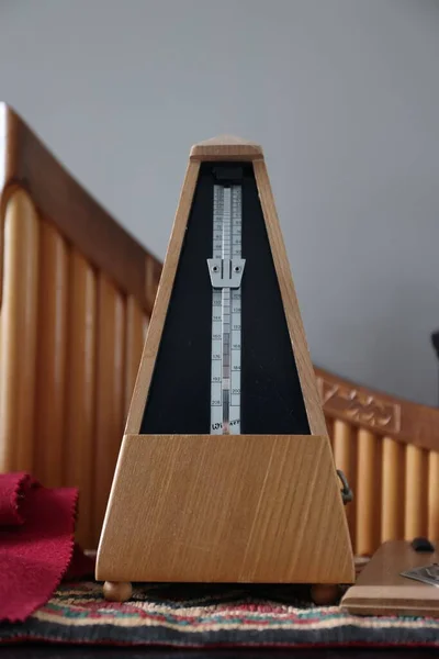 Vertical Shot Light Brown Metronome Table — Stock Photo, Image