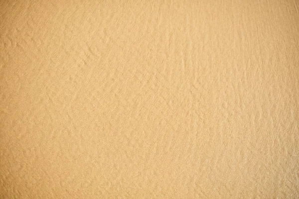 背景として美しい砂の質感と表面を持つ海のトップビュー — ストック写真